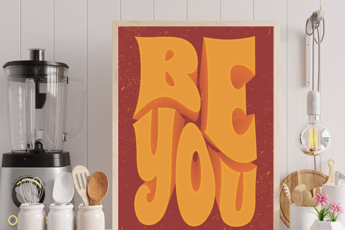 Close up of orange and yellow 3D lettering on a vintage style motivational poster